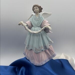 "Joyful Offering" Angel Tree Topper by Lladró; model #6125.